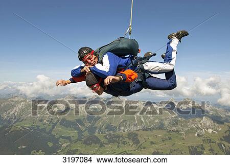 Picture - Skydiver in tandem, Saanen, Switzerland . Fotosearch