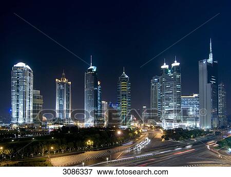 Stock Photo - Skyscraper in Pudong, Shanghai, China. Middle: Jinmao Tower . Fotosearch