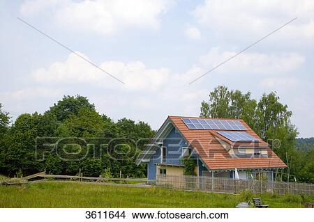 Solar panels on the roof of a detached house, Schoemberg, Baden-Wuerttemberg, Germany View Large Photo Image Picture - Solar panels on the roof of a detached house, Schoemberg, Baden-Wuerttemberg, Germany . Fotosearch