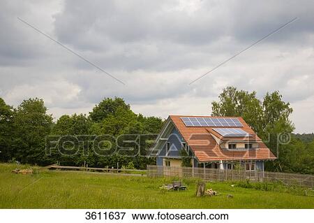 Stock Photo - Solar panels on the roof of a detached house, Schoemberg, Baden-Wuerttemberg, Germany . Fotosearch