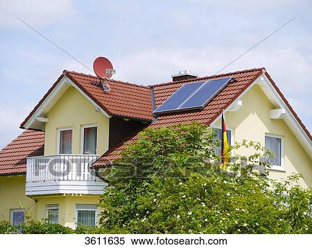Stock Photography - Solar panels on the roof of a detached house, Schoemberg, Baden-Wuerttemberg, Germany . Fotosearch