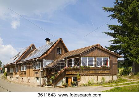 Stock Image - Solar panels on the roof of a house, Schoemberg, Baden-Wuerttemberg, Germany . Fotosearch