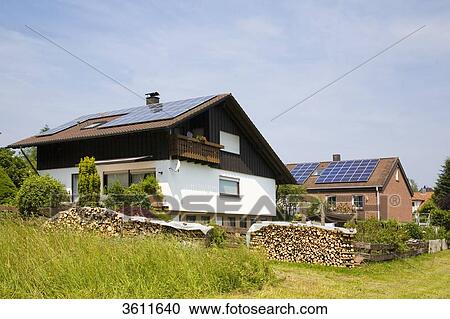 Solar panels on the roof of two detached houses, Schoemberg, Baden-Wuerttemberg, Germany View Large Photo Image Stock Image - Solar panels on the roof of two detached houses, Schoemberg, Baden-Wuerttemberg, Germany . Fotosearch