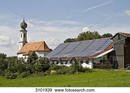 Solar system on an agricultural building in Bavaria, Germany View Large Photo Image Stock Photo - Solar system on an agricultural building in Bavaria, Germany . Fotosearch