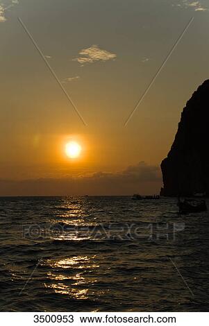 Sunset on Koh Phi Phi Island, Thailand View Large Photo Image Stock Image - Sunset on Koh Phi Phi Island, Thailand . Fotosearch