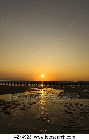 Stock Image - Sunset, Wangerooge, Lower Saxony, Germany, Europe . Fotosearch