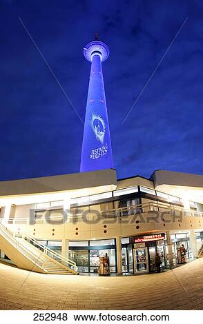 Stock Photo - Television tower and building lit up at night, Alexanderplatz, Berlin, Germany . Fotosearch
