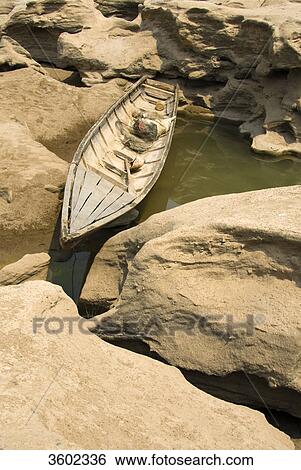 Stock Photograph - The rock desert of Sam Phan Bok, Pha Taem National Park, Thailand . Fotosearch