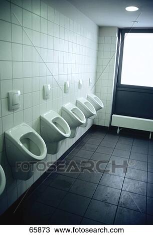 Toilet urinals in a row View Large Photo Image Stock Image - Toilet urinals in a row . Fotosearch