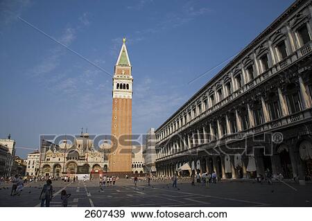 Tourists at city square, Saint Mark's Square, Basilica San Marco, Campanile, Veneto, Venice, Italy View Large Photo Image Stock Photo - Tourists at city square, Saint Mark's Square, Basilica San Marco, Campanile, Veneto, Venice, Italy . Fotosearch