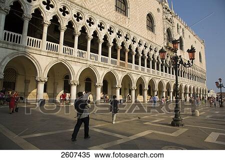 Stock Photography - Tourists at palace, Doges Palace, St. Mark's Square, Veneto, Venice, Italy . Fotosearch