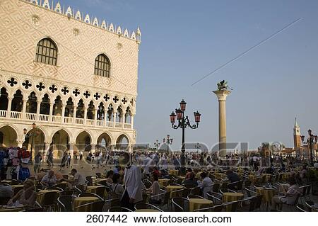 Stock Image - Tourists at town square, Doges Palace, St. Mark's Square, Veneto, Venice, Italy . Fotosearch