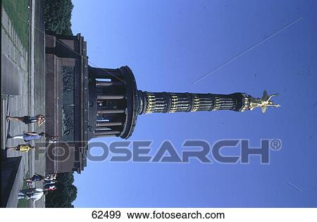Tourists near monument, Angel on Victory Column, Tiergarten Park, Berlin, Germany View Large Photo Image Stock Photo - Tourists near monument, Angel on Victory Column, Tiergarten Park, Berlin, Germany . Fotosearch