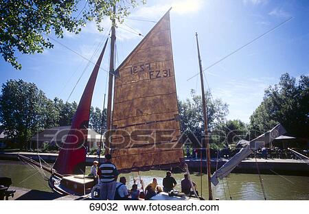 Tourists on sailboat at harbor, Wustrow, Mecklenburg-Western Pomerania, Germany View Large Photo Image Stock Image - Tourists on sailboat at harbor, Wustrow, Mecklenburg-Western Pomerania, Germany . Fotosearch