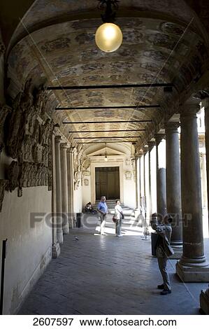 Stock Photo - Tourists standing in gallery . Fotosearch