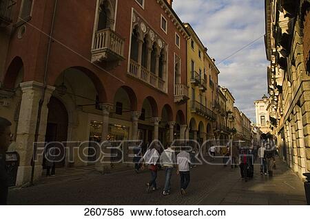 Stock Photography - Tourists walking on road, Corso Andrea Palladio, Vicenza, Veneto, Italy . Fotosearch