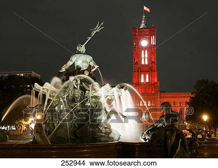 Picture - Town hall and fountain lit up at night, Berlin, Germany . Fotosearch