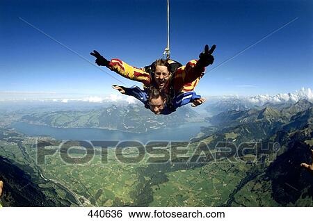 Two men skydiving View Large Photo Image Stock Photograph - Two men skydiving . Fotosearch
