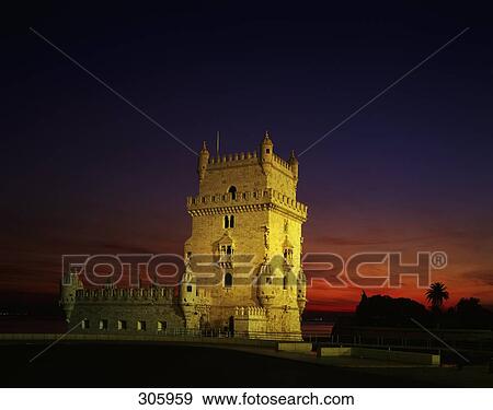 Stock Photo - Watchtower lit up at night, Belem Tower, Lisbon, Portugal . Fotosearch