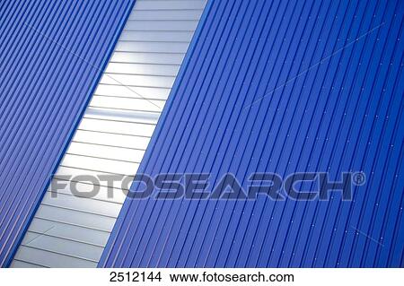 Windows on blue wall of storehouse View Large Photo Image Picture - Windows on blue wall of storehouse . Fotosearch