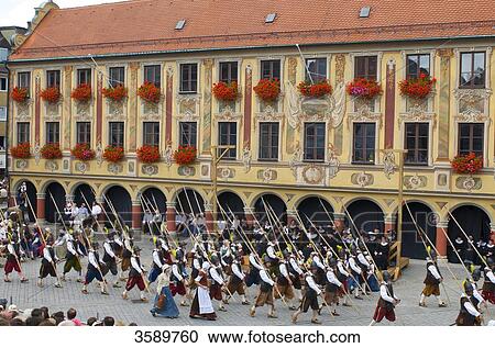 Stock Image - Actors in front of Steuerhaus, Memmingen, Bavaria, Germany, Europe . Fotosearch