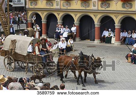 Stock Photo - Actors in front of Steuerhaus, Memmingen, Bavaria, Germany, Europe . Fotosearch
