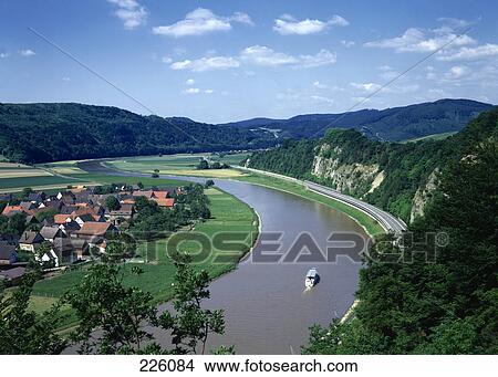 Aerial view of steamboat in river, Weser Uplands, Lower Saxony, Germany View Large Photo Image Picture - Aerial view of steamboat in river, Weser Uplands, Lower Saxony, Germany . Fotosearch