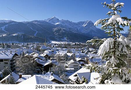 Aerial view of town covered in snow, Garmisch Partenkirchen, Bavaria, Germany View Large Photo Image Stock Photography - Aerial view of town covered in snow, Garmisch Partenkirchen, Bavaria, Germany . Fotosearch