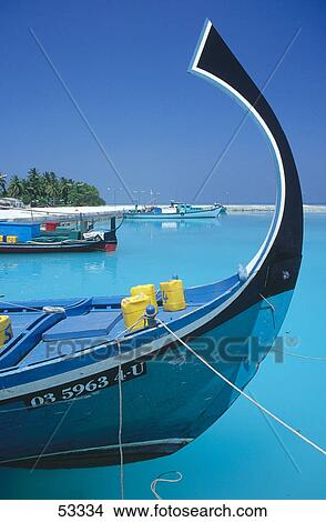 Boat moored at beach, Maldives View Large Photo Image Picture - Boat moored at beach, Maldives . Fotosearch