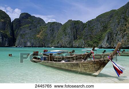 Stock Photography - Boat on beach, Maya Beach, Koh Phi Phi Leh, Krabi Province, Thailand . Fotosearch