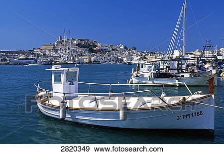 Boats at harbor, Dalt Vila, Ibiza Town, Ibiza, Balearic Islands, Spain View Large Photo Image Stock Photo - Boats at harbor, Dalt Vila, Ibiza Town, Ibiza, Balearic Islands, Spain . Fotosearch