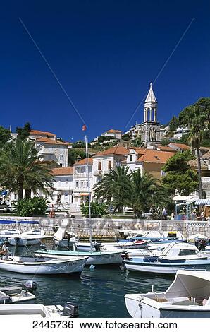 Stock Photograph - Boats at harbor, Hvar, Dalmatia, Croatia . Fotosearch