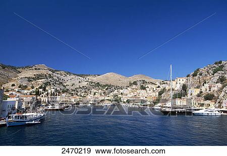 Boats at harbor, Symi, Dodecanese Islands, Southern Aegean, Greece View Large Photo Image Stock Photo - Boats at harbor, Symi, Dodecanese Islands, Southern Aegean, Greece . Fotosearch