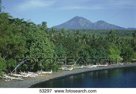 Stock Photo - Boats on beach, Bali, Indonesia . Fotosearch