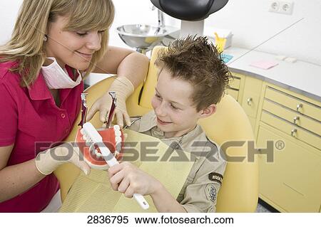 Boy at dentist View Large Photo Image Stock Photography - Boy at dentist . Fotosearch