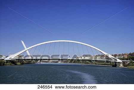 Picture - Bridge across river, Barqueta Bridge, Guadalquivir River, Seville, Andalusia, Spain . Fotosearch