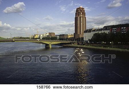 Bridge across river, Floesserbruecke Bridge, Main River, Lindner Hotel Main Plaza, Frankfurt, Hesse, Germany View Large Photo Image Stock Photograph - Bridge across river, Floesserbruecke Bridge, Main River, Lindner Hotel Main Plaza, Frankfurt, Hesse, Germany . Fotosearch