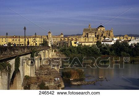 Bridge across river with mosque in background, Puente Romano, Guadalquivir River, Mezquita Catedral de Cordoba, Cordoba, Andalusia, Spain View Large Photo Image Stock Image - Bridge across river with mosque in background, Puente Romano, Guadalquivir River, Mezquita Catedral de Cordoba, Cordoba, Andalusia, Spain . Fotosearch