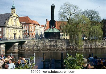 Stock Photo - Buildings along river, River Lune, Luneburg, Saxony, Germany, Europe . Fotosearch