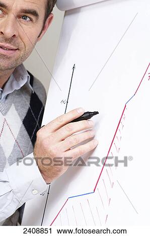 Businessman giving presentation in seminar View Large Photo Image Stock Image - Businessman giving presentation in seminar . Fotosearch