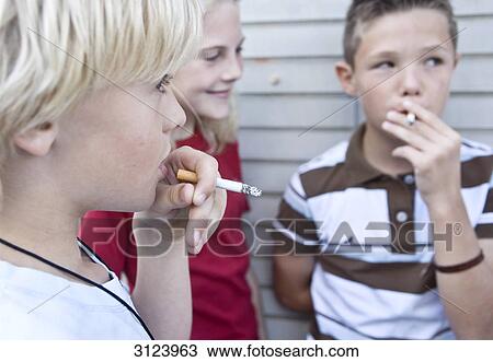 Children smoking cigarettes, close-up View Large Photo Image Stock Image - Children smoking cigarettes, close-up . Fotosearch