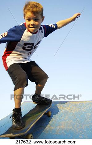Close-up of boy skateboarding View Large Photo Image Stock Image - Close-up of boy skateboarding . Fotosearch