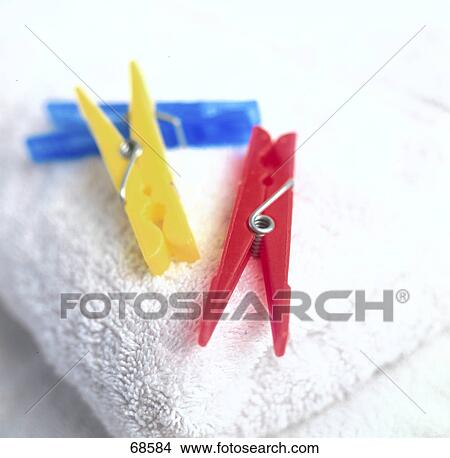 Picture - Close-up of clothespins on towel . Fotosearch