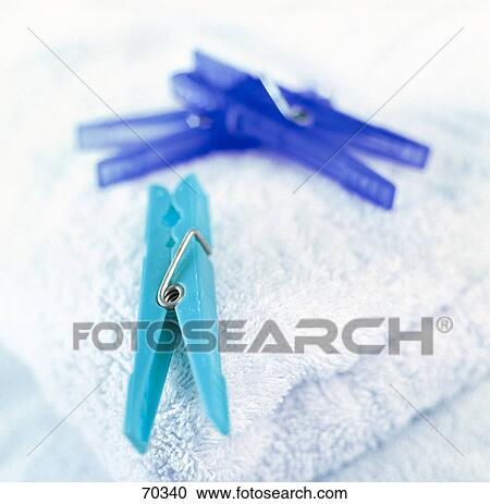 Close-up of clothespins on towel View Large Photo Image Stock Image - Close-up of clothespins on towel . Fotosearch