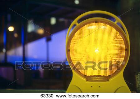 Stock Image - Close-up of construction warning light . Fotosearch