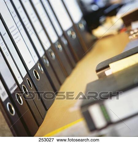 Close-up of files in row View Large Photo Image Stock Photo - Close-up of files in row . Fotosearch