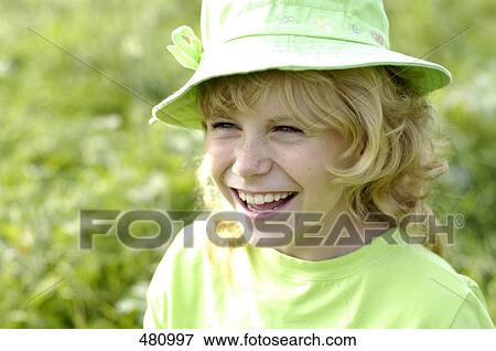 Stock Photo - Close-up of girl smiling . Fotosearch