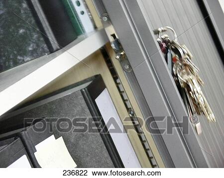 Stock Image - Close-up of key in lock . Fotosearch