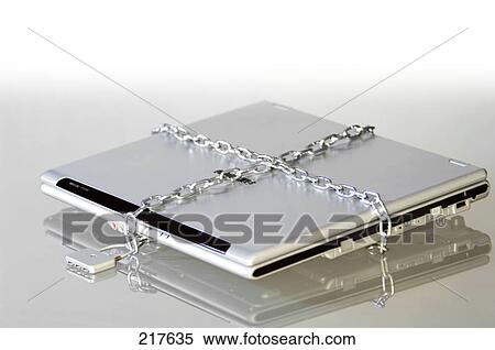 Stock Photography - Close-up of laptop and padlock . Fotosearch