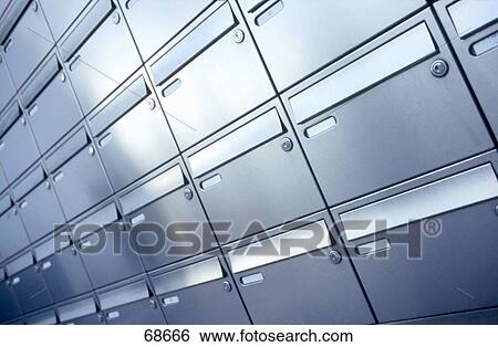 Close-up of mailboxes in rows View Large Photo Image Stock Photograph - Close-up of mailboxes in rows . Fotosearch